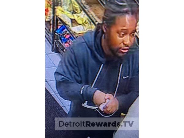 Suspect male with braids, wearing a black Nike sweatshirt and black sweat pants.