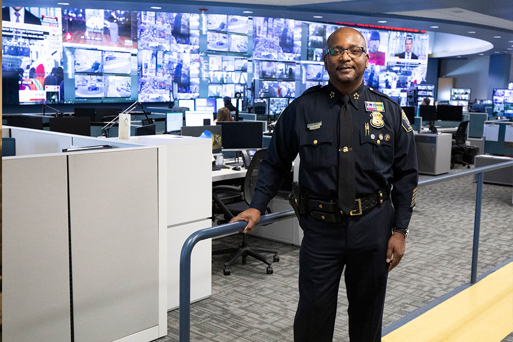 Chief White in the state of the art Real Time Crime Center.