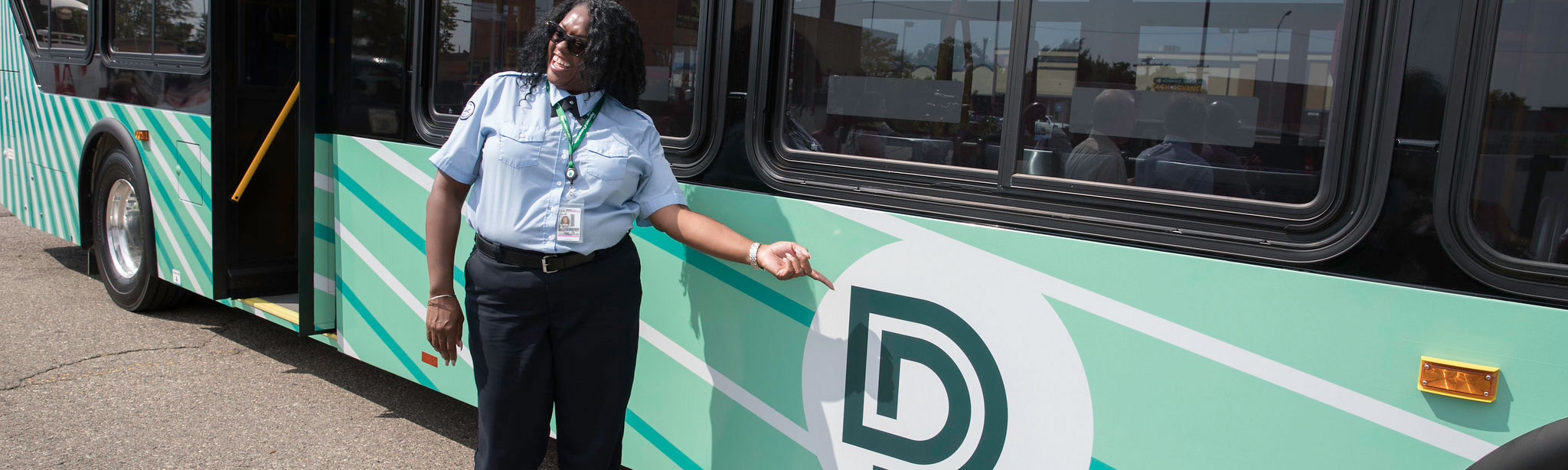 DDOT Woman Points the D