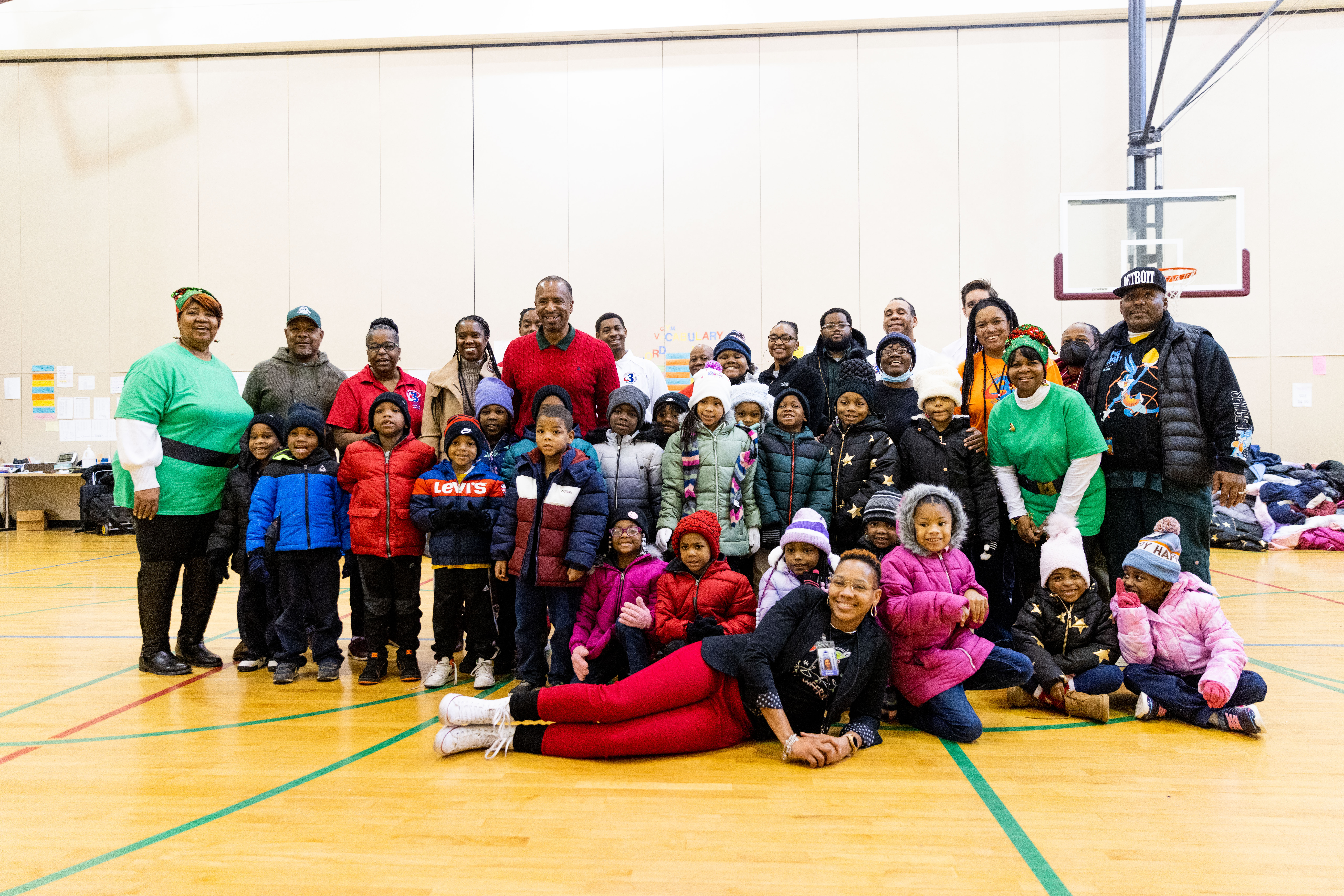 Councilman Scott Benson and Everyone posing with the kids and their new coats