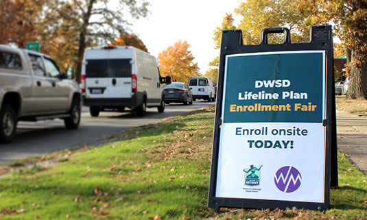 Enroll onsite today sign