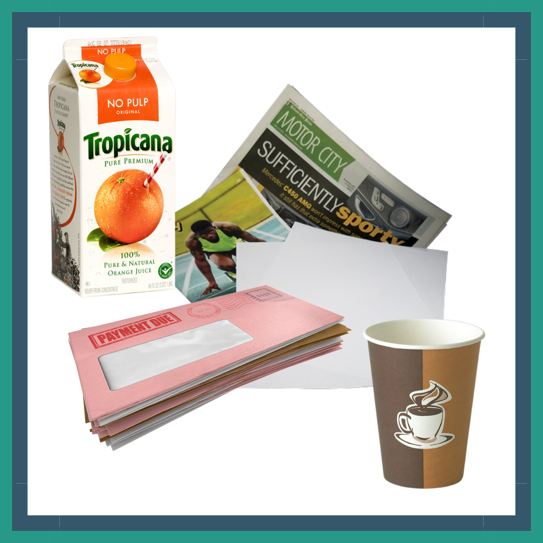 coffee cups, envelopes, juice carton and magazines