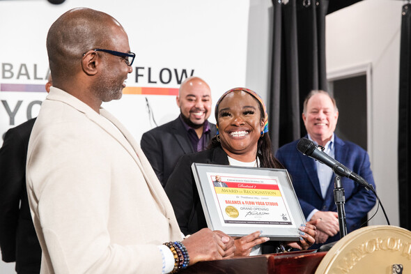 Co-owners Dr. Thaddeus Irby and Princess Galloway accepting an Award of Recognition 