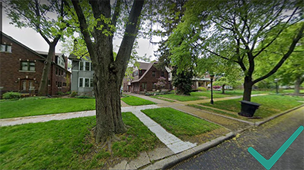 An example of correct grading shown by its sloped front lawn that gives the street frontage distinctive character