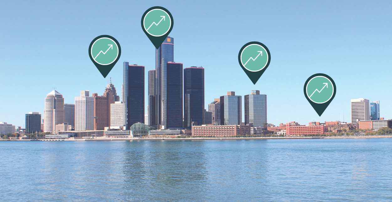The Detroit Skyline with building Energy Charts above them.