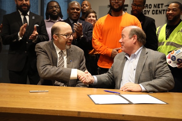 Brian Richard, business manager of IBEW Local 58 and Mayor Mike Duggan