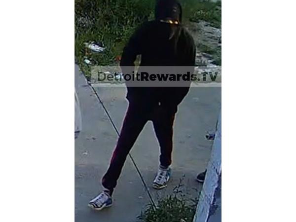 Suspect 2 - Male or female, early 20s, last seen wearing a black ski mask, black hooded sweatshirt, and black pants with a red stripe.